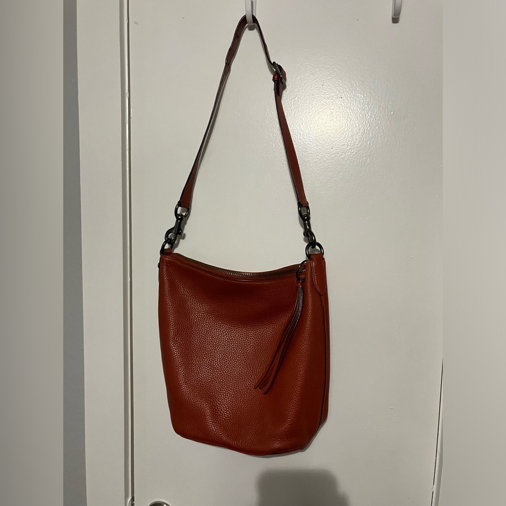 Coach pebble Leather shoulder bag. Color is Chili.